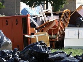 Trash related to flood damage has been piled high in neighbourhoods of Windsor's East Riverside area on Oct. 6, 2016.