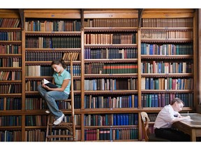 Students in the library. Photo by Getty Images.
