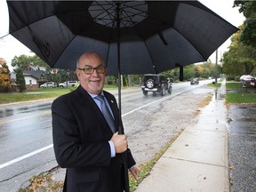 Tecumseh Mayor Gary McNamara is shown on the narrow sidewalk on Riverside Drive just east of Lesperance Road on Wednesday, October 26, 2016. The town is looking to spend $775,000 to expand the Ganatchio Trail by about 2.5 kilometres.