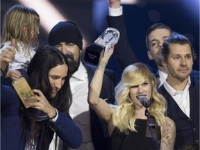 Walk Off the Earth celebrates its Juno win for Group of the Year at the Juno Awards in Calgary on April 3, 2016.