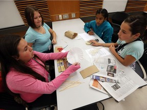 May Bondy, Alexis Cassan, Ananya Sood and Maysie Dugal (left to right) work on their project during the Go Eng Girl event at the University of Windsor Centre for Engineering Innovation on Saturday, October 22, 2016.