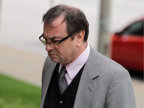 Disgraced priest Robert Couture enters Superior Court in Windsor for his sentencing on Monday, Oct. 3, 2016.