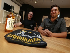 Dean Scott (left) and Rick Santarossa (right) of Windsor's Shoutabout Creative Agency share a smile about Premier Kathleen Wynne calling their ad campaign for Liquormen's whiskey "dangerous." The alcohol brand is part of the Trailer Park Boys universe. Photographed in Walkerville on Oct. 4, 2016.