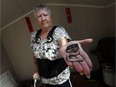 Marilyn LaFrance displays the lock that was broken by thieves who stole her wheelchair from her backyard shed, in Windsor on Friday, Oct. 7, 2016.