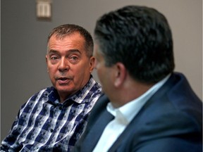 In this file photo, Windsor Regional Hospital CEO David Musyj, right, and hospital committee co-chair Dave Cooke talk with the Windsor Star editorial board Tuesday about the $2-billion mega-hospital project.