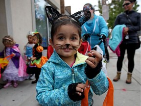 The Downtown Windsor BIA and Ontario Early Years Centre joined forces Monday to introduce immigrant families to the custom of trick-or-treating. About 14 downtown businesses gave out candy to more than 70 children.