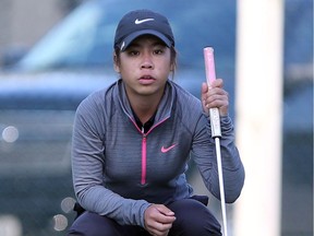 Jasmine Ly from Holy Names lines up a putt during the 2016 OFSAA girls' golf festival at Roseland Golf and Curling Club in Windsor, Ont., on Oct. 12, 2016.