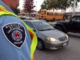 City of Windsor parking enforcement officers conduct a blitz in front of Bellewood school in South Windsor on Monday, Oct. 17, 2016.