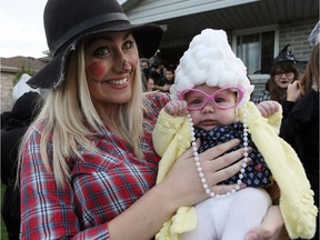 Shelby Wright and her two-month-old daughter Paisley were ready for tricks and treats during a Halloween bash at the home on Acorn Cresent Monday.