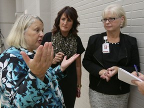 Lorraine Duff, Director Special Projects, United Way Toronto and York Region, left,  Lorraine Goddard -CEO United Way Windsor-Essex, and Janice Kaffer, president and CEO of Hotel-Dieu Grace Healthcare, talk with the media after HDGH's Report to the Community was released to the public.