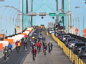 Cyclists make their way across the Ambassador Bridge during Bike the Bridge 2016 on October 9, 2016.