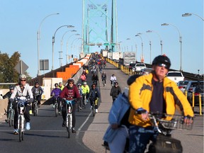 Cyclists make their way across the Ambassador Bridge during Bike the Bridge 2016 on October 9, 2016.