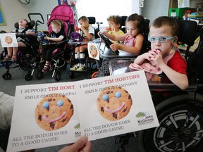 Tim Hortons raised more than $91,000 from its Smile Cookie fundraiser for the John McGivney Children's Centre in Windsor.