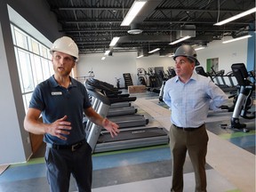The new Windsor YMCA at the Central Park Athletics facility is nearing completion. Andy Sullivan, left, general manager of the new Windsor YMCA, and Andrew Lockie, CEO, YMCA of Western Ontario, are shown during a media tour on Sept. 7, 2016 in a fitness room.