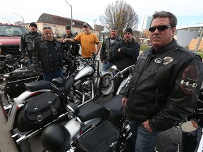 Friends Jeff House, David Blandford, Tim Smith, Justin Bailey, Randy George, Ralph Middleton and Ron Storrey (left to right) get together for a ride for their friend Dino Trombley in Windsor on Tuesday, November 29, 2016. Trombley was killed in an industrial accident last week on Nov. 16th. The accident has raised concerns over safety inspections.