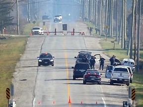 Amherstburg police on County Road 18 at the scene of the fatal collision that took the life of 30-year-old Adam Pouget on Nov. 17, 2016.