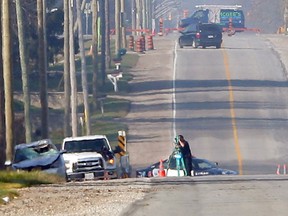Police block County Road 18 at Concession 4 following a crash early on Nov. 17, 2016.