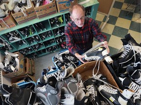 Art Roth, co-ordinator of the skate lending program at the All Saints Church in Windsor, is preparing for another season of skating activities. He's shown sorting through skates on Nov. 30, 2016.