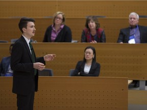 Matas Sriubiskis, from Queens University, delivers a presentation with his two team members (not pictured) during the University of Windsor RBC EPIC Business Model Canvas Competition at the University of Windsor, Saturday, Nov. 26, 2016.