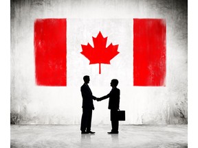 Shaking hands. Free trade. Canada. Image by Getty Images.