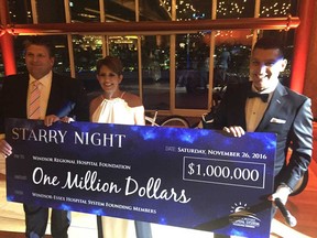 From left: Windsor Regional Hospital president David Musyj, Michelle Prince, and WFCU president Eddie Francis with the $1 million giant cheque at the Starry Night fundraiser at Caesars Windsor's Augustus 27 venue on Nov. 26, 2016.