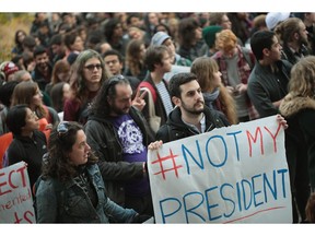 CHICAGO, IL - NOVEMBER 15:  Students at the University of Chicago participate in a walk-out and rally to protest President-elect Donald Trump on November 15, 2016 in Chicago, Illinois. The walk-out was one of several staged today on Chicago-area campuses and one of many protests staged nationwide since Trump won the election.
