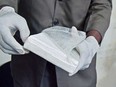 A slab of cocaine is shown as evidence in the trial of an accused drug smuggler in Nairobi, Kenya, on Nov. 11, 2016.