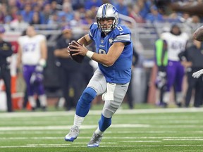 Detroit Lions quarterback Matthew Stafford runs for a first down during an NFL game between the Detroit Lions and the Minnesota Vikings at Ford Field on Nov. 24, 2016.
