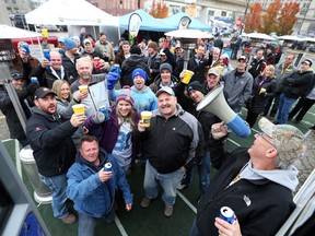 Nearly 90 farmers from southwestern Ontario enjoy a tail-gate party outside Ford Field in Detroit, Michigan on Nov. 24, 2016. The annual event hosted by Southwest AG Partners is a way of thanking the farmers in the region.