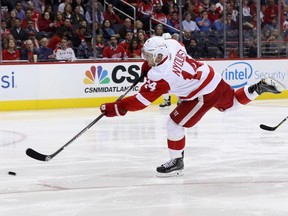 Gustav Nyquist (14) of the Detroit Red Wings takes a shot on goal in the third period against the Washington Capitals at Verizon Center on Nov. 18, 2016 in Washington, D.C.