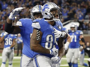Detroit Lions tight end Eric Ebron reacts after rushing for a touchdown during the second half of an NFL football game against the Jacksonville Jaguars on Nov. 20, 2016 in Detroit, Mich.
