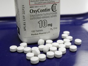 This Feb. 19, 2013, photo shows OxyContin pills.