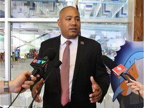 Michael Coteau, Ontario Minister of Tourism, Culture and Sport speaks to reporters at the Windsor International Aquatic and Training Centre on June 15, 2015.