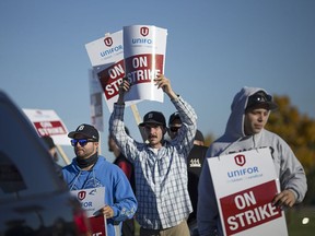 Integram workers form a picket line outside the Integram facility on Patillo Road., Sunday, Nov. 6, 2016.