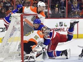 Essex's Matt Puempel, seen crashing the net for the New York Rangers against the Philadelphia Flyers, became a member of the Detroit Red Wings organization on Saturday in one of two trades made by the club.