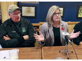 Ontario NDP Leader Andrea Horwath is shown with local dairy farmer Bernard Nelson at the Arner Stop restaurant in Kingsville on Nov. 8, 2016, where they were discussing high hydro rates in the province.