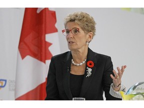 Premier Kathleen Wynne addresses the audience during the Ontario Economic Summit at White Oaks in Niagara-on-the-Lake on Friday, Nov. 4, 2016. Mike DiBattista/Niagara Falls Review/Postmedia Network