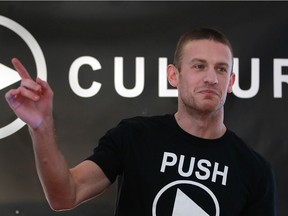 Triathlete Lionel Sanders gives a talk at Cycle Culture in Tecumseh on Dec. 7, 2013.