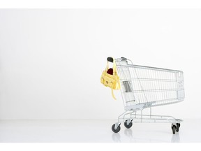 Shopping cart with a handbag. Photo by Getty Images.