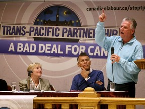 Emphatic Ken Lewenza, right, makes a point against Trans-Pacific Partnership as Maude Barlow, left, national chair of Council of Canadians, and Hassan Yussuff, leader of Canadian Labour Congress, listen during a question and answer period of a town hall meeting dealing with possible harmful effects of the TPP at the Ciociaro Club of Windsor on  Nov. 2, 2016.