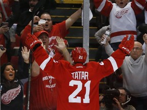 Detroit Red Wings' Tomas Tatar (21) celebrates his goal against the Tampa Bay Lightning in the second period of Game 6 of a first-round NHL Stanley Cup hockey playoff series on April 27, 2015, in Detroit.