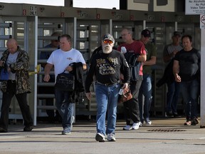 Employees exit the the Ford Essex Engine Plant in Windsor on Nov. 1, 2016. Ford has reached a tentative deal with Unifor that is will see a $700-million investment in one or both Windsor plants.