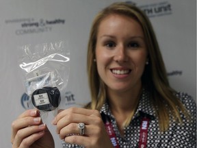 Chantelle Botscheller, from the Windsor-Essex County Health Unit, holds up a radon test kit in Windsor on Nov. 14, 2016. The health unit is distributing another round of radon test kits.