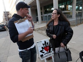 Jeff Durham and Nancy Kaake talk outside of Superior Court following a guilty plea in the Cassandra Kaake murder case in Windsor on Nov. 14, 2016.