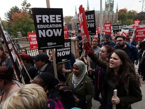 WINDSOR, ON. NOVEMBER 2, 2016. --  Students hold a rally at to protest the cost of education at the University of Windsor in Windsor on Wednesday, November 2, 2016. The rally was part of the National Day of Action against the cost of education.          (TYLER BROWNBRIDGE / WINDSOR STAR)