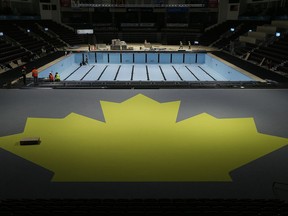 The temporary 25-metre pool at the WFCU Centre that next week hosts the 13th FINA World Championships nears completion. Crews continue to work on the pool at the WFCU Centre on Nov. 28, 2016.
