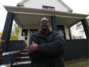 Cedric Jones stands in front of his home in the Detroit neighbourhood of Delray, near the site of the Gordie Howe International Bridge, on  Nov. 3, 2016.