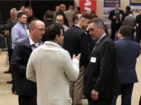 Local contractors meet with representatives from the three consortiums bidding on the Gordie Howe Bridge at a meet and greet event at the St. Clair Centre for the Arts in Windsor on Wednesday, Nov. 30, 2016.