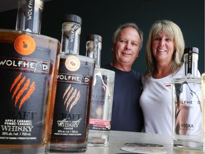Co-owners Tom and Sue Manherz of Wolfhead Distillery are shown in May 2016.