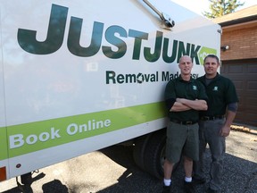 Just Junk co-owners David Hayes and Kevin Murray, shown on Nov. 10, 2016, have enjoyed steady business since launching the Windsor franchise three years ago.